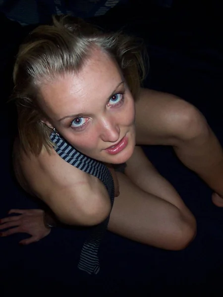 A flexible blonde wants to lick her pussy photo 9