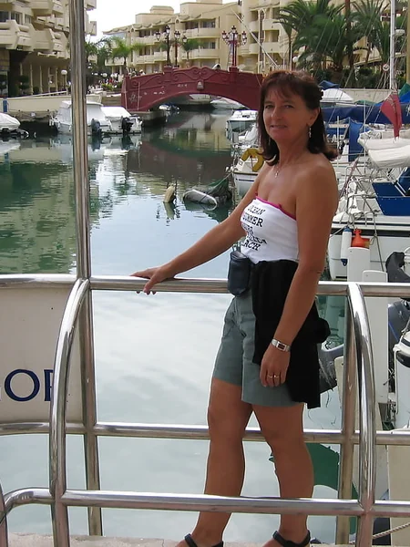 A sexy mature lady spreads her legs photo 5