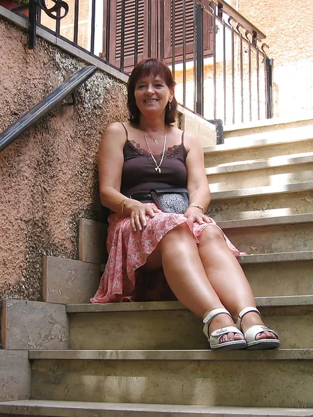 A sexy mature lady spreads her legs photo 6