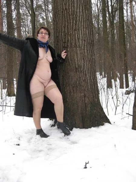 A chubby mature lady prefers to pose nude outdoors photo 6