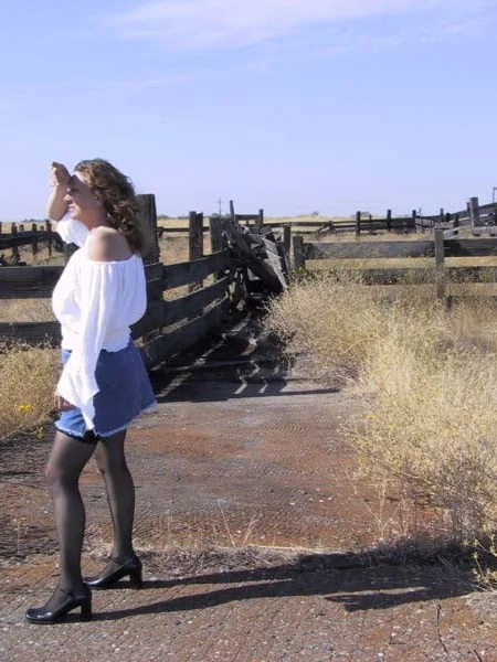 A farmer's wife strips naked in the cattle pen photo 1