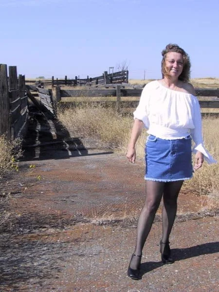 A farmer's wife strips naked in the cattle pen photo 2