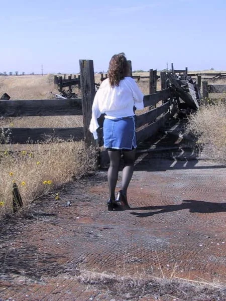 A farmer's wife strips naked in the cattle pen photo 3