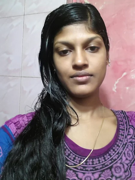 A young Indian woman shows off her tits photo 1