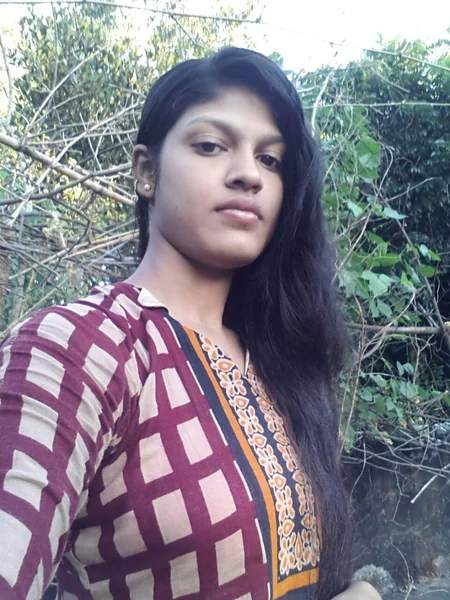 A young Indian woman shows off her tits photo 11