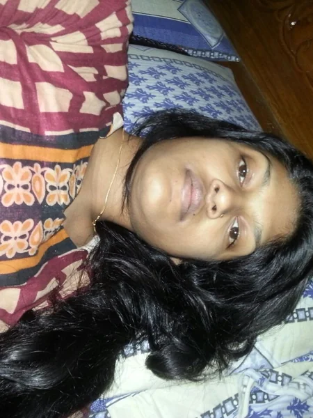 A young Indian woman shows off her tits photo 12