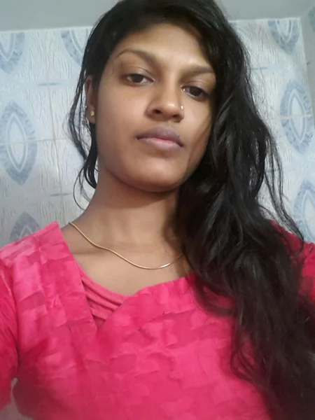 A young Indian woman shows off her tits photo 14