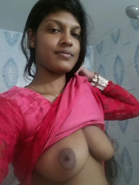 A young Indian woman shows off her tits photo 16