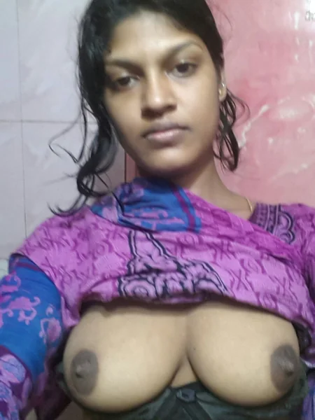 A young Indian woman shows off her tits photo 8