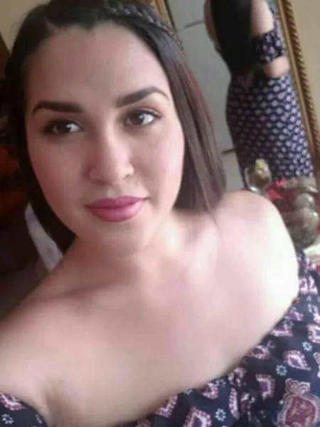 A young Latina shows off her thighs photo 1