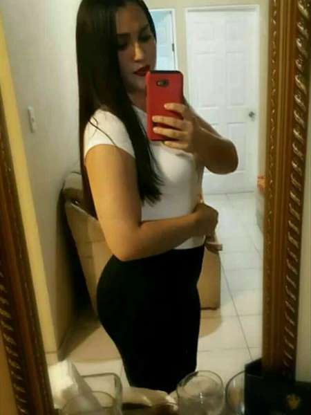 A young Latina shows off her thighs photo 9