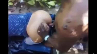 Black man fucks dirty slut's ass in the bushes