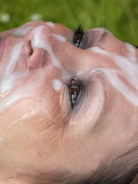 An older woman likes cum on her face photo 10