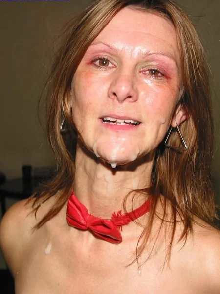 An older woman likes cum on her face photo 18