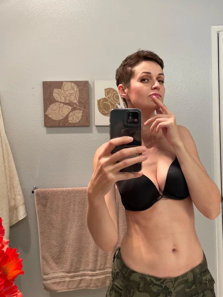 A skinny MILF with saggy tits photo 29