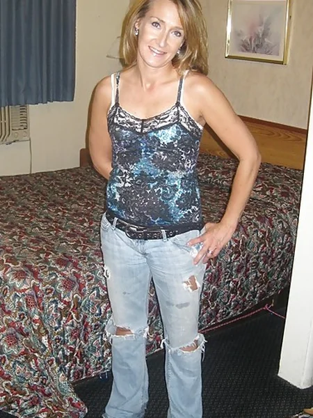 The antics of a long-legged mature woman photo 1