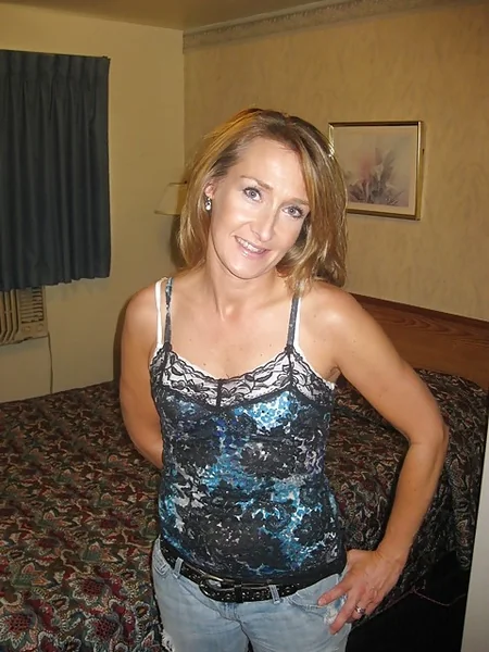 The antics of a long-legged mature woman photo 2